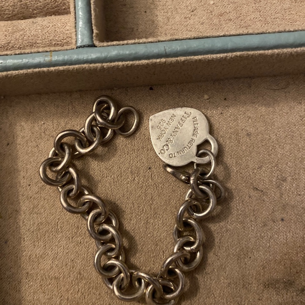 Tiffany and Co silver chain bracelet. Silver heart pendant.